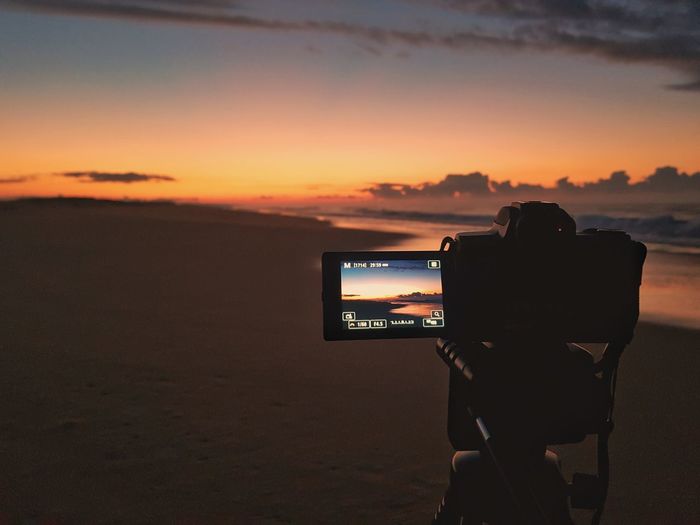 Sunset photography through two cameras