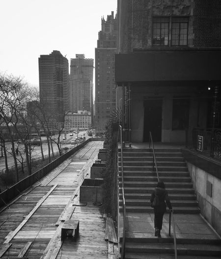 Man standing in front of building