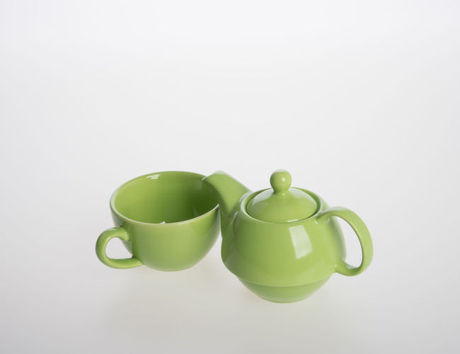 Close-up of green tea against white background