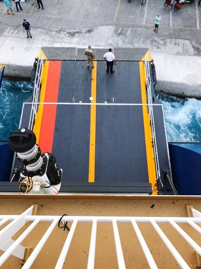 High angle view of men standing on ship