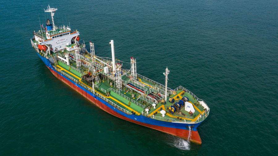 Aerial view oil and gas tanker petrochemical offshore in open sea, refinery industry cargo ship, 