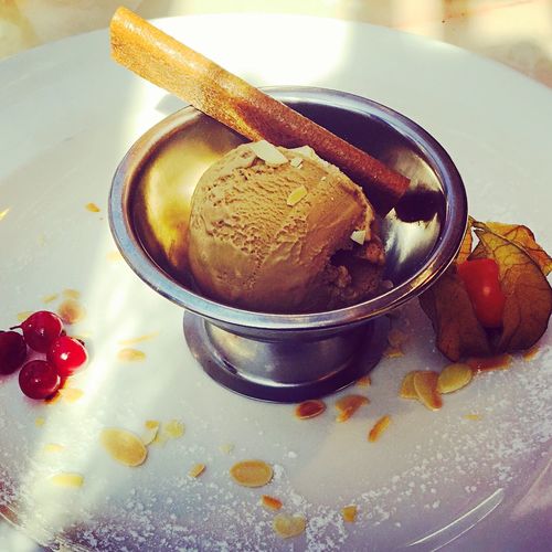High angle view of ice cream in container on table
