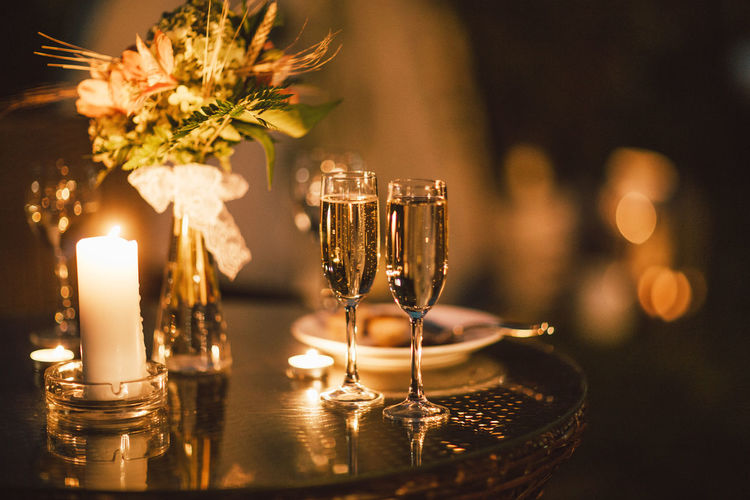 Close-up of champagne flutes on table