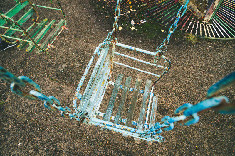 High angle view of empty swing hanging in park