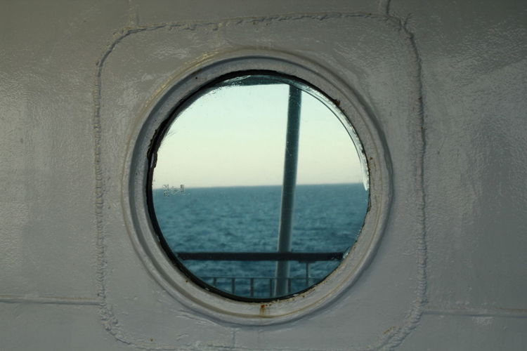 Sea seen through window of boat