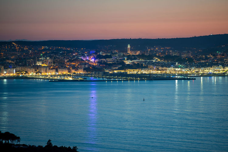Scenic view of sea against sky at night