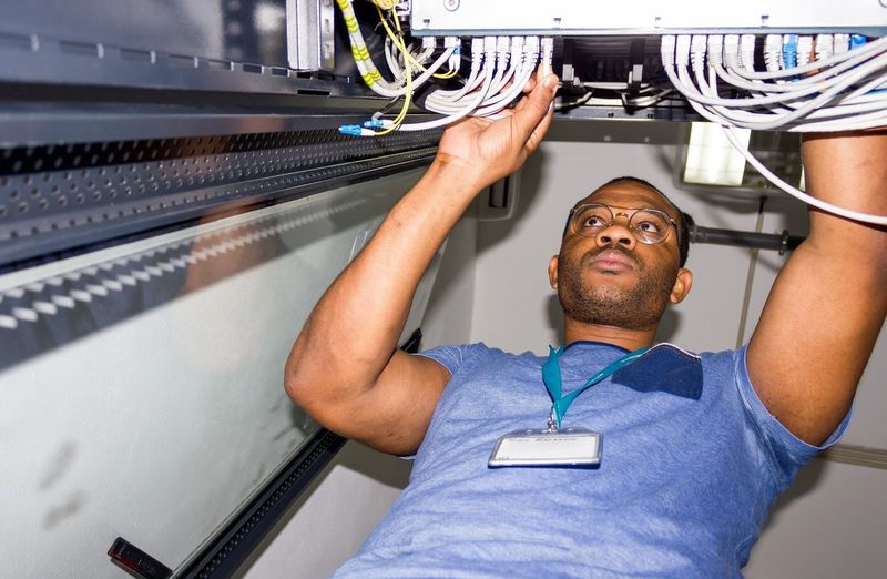 Man working on cable