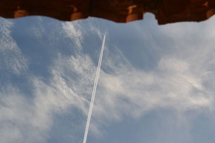 Low angle view of vapor trail in sky