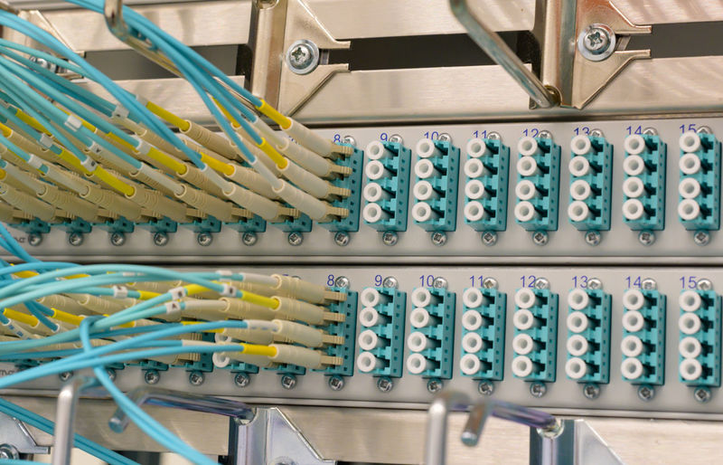 Network switch with fiber optic network cables in a data center