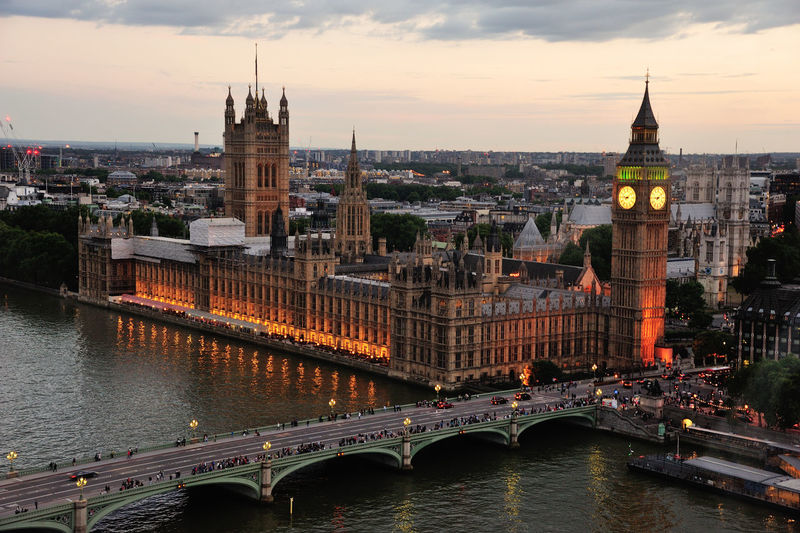 High angle view of westminster bridge over thames river by big ben in city