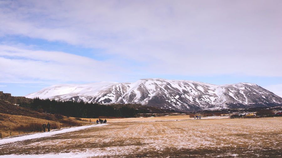 Scenic view of snow covered mountains