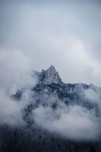 Scenic view of volcanic mountain against sky