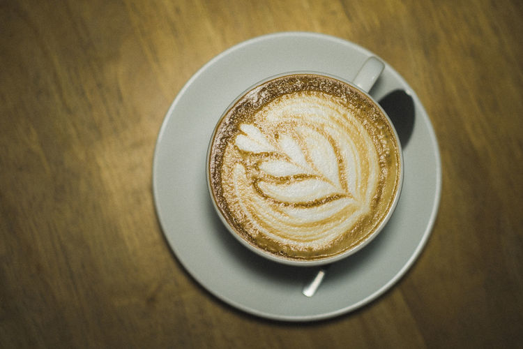 Directly above shot of cappuccino on table