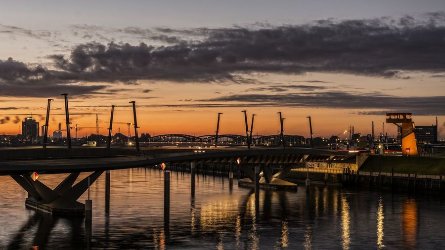 Bridge over elbe river during sunset
