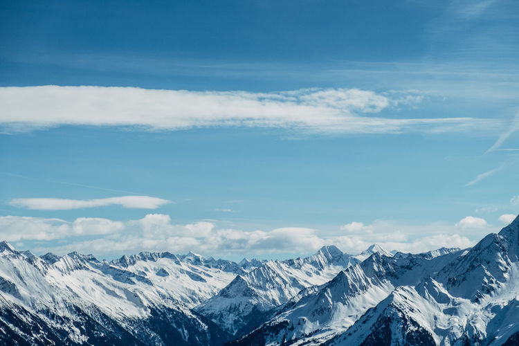 Scenic view of snowcapped mountains against sky