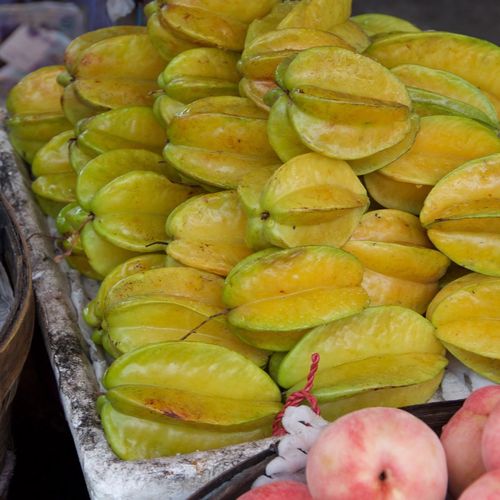 High angle view of carambola fruits at market stall