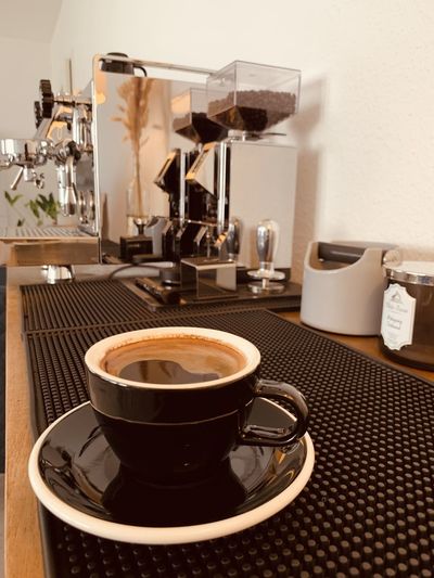 Close-up of coffee cup on table