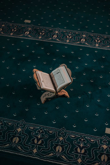 High angle view of book on floor