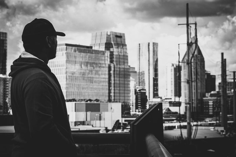 Man looking at cityscape