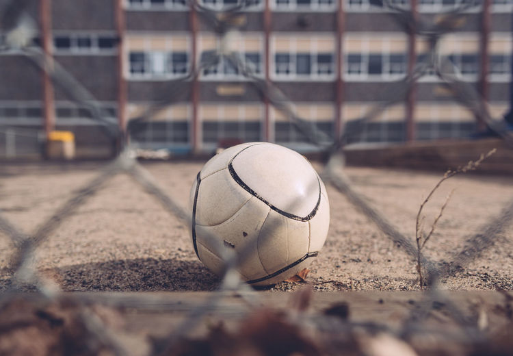 Soccer ball in empty playground
