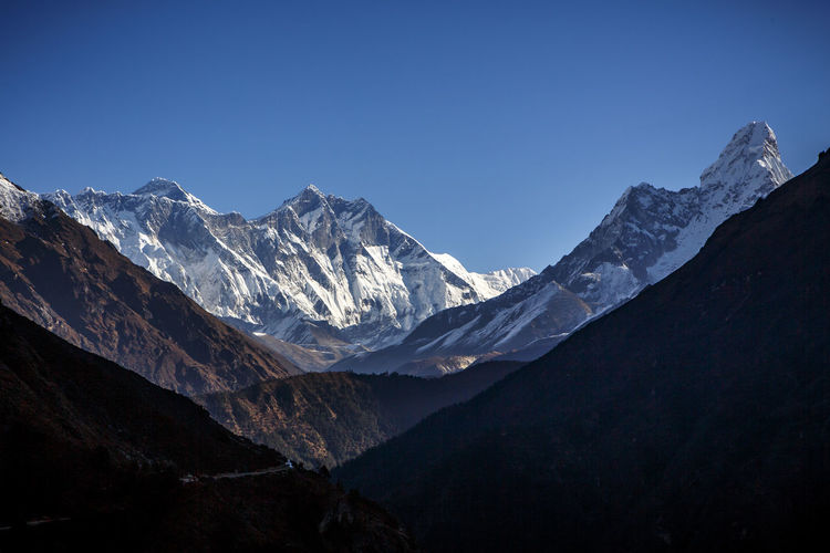 The himalayan peaks of everest (left), llotse (center) and ama dablam.