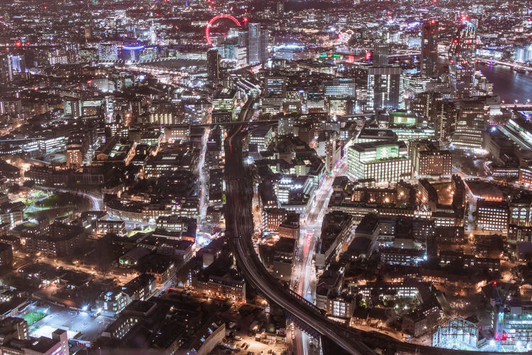 Aerial view of illuminated city 