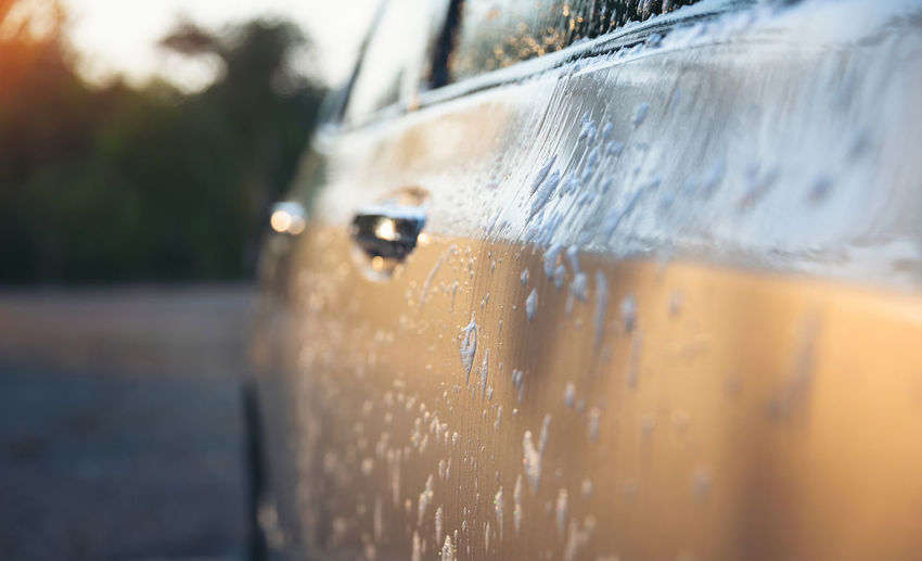 Close-up of wet car outdoors