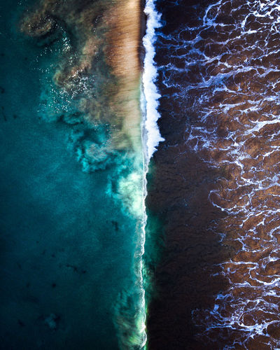 Sea waves splashing on shore