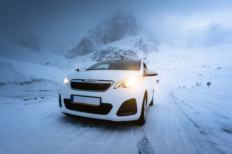 Car on snow covered land