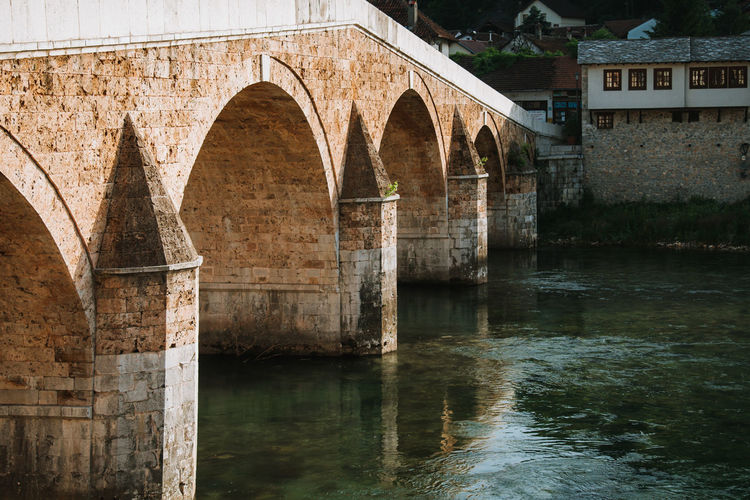 Arch bridge over river