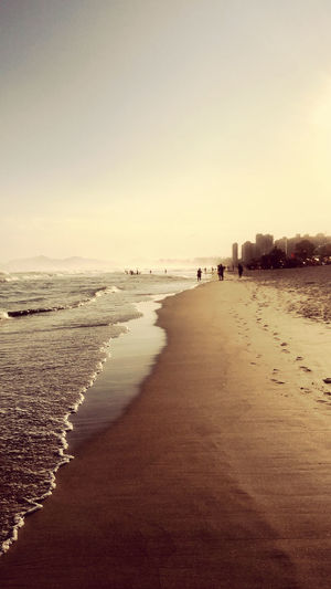 Scenic view of beach against clear sky
