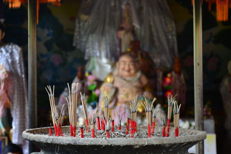 Close-up of lit temple