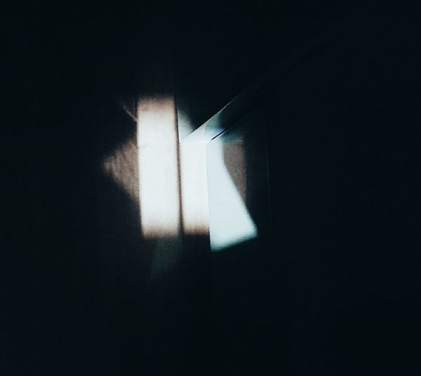 Sunlight through window in dark room