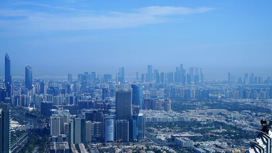 Aerial panorama of abu dhabi downtown in summer morning
