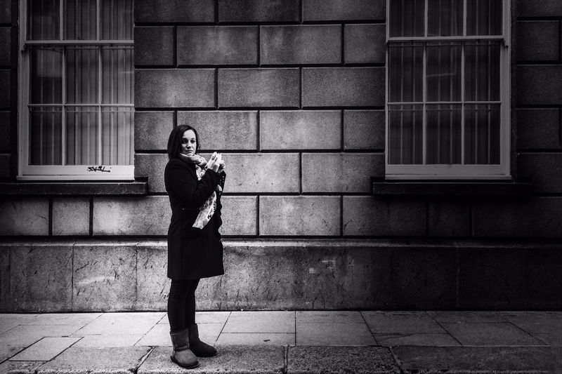 Woman photographing with mobile phone