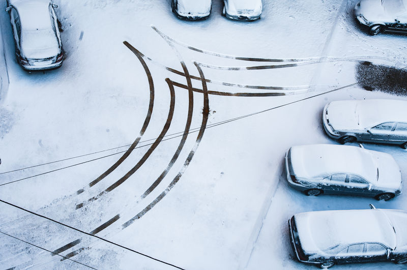 High angle view of snow on car during winter