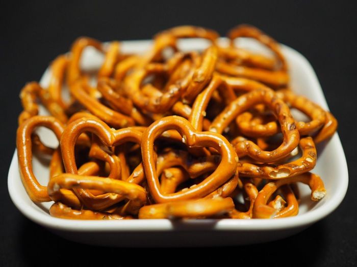 High angle view of pretzel in bowl on table