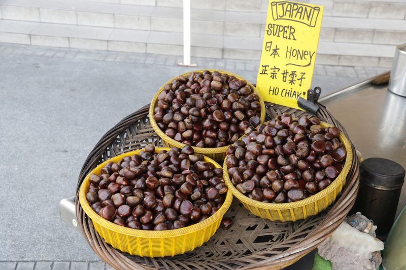 High angle view of chestnuts for sale at market