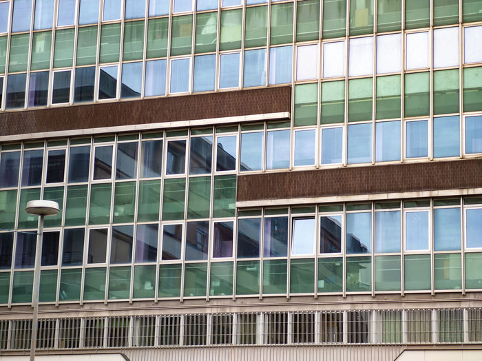 Financial and banking building with windows and urban reflection