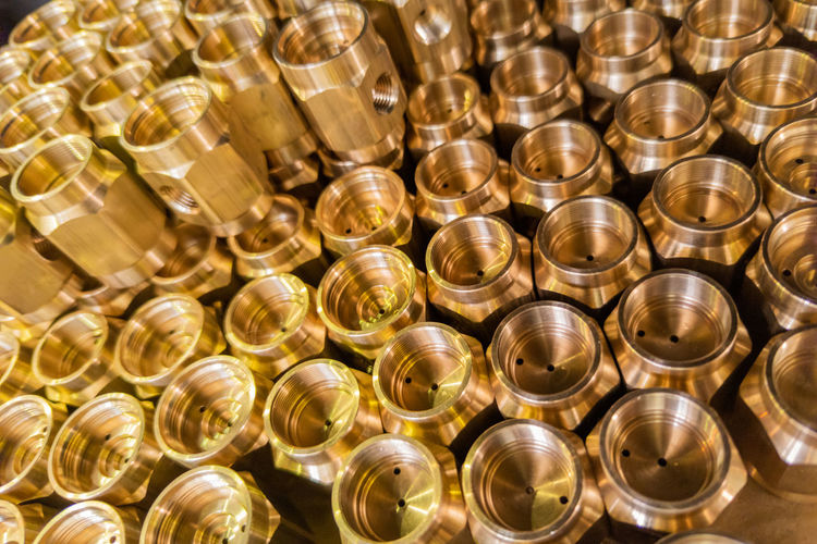Full frame shot of brass containers