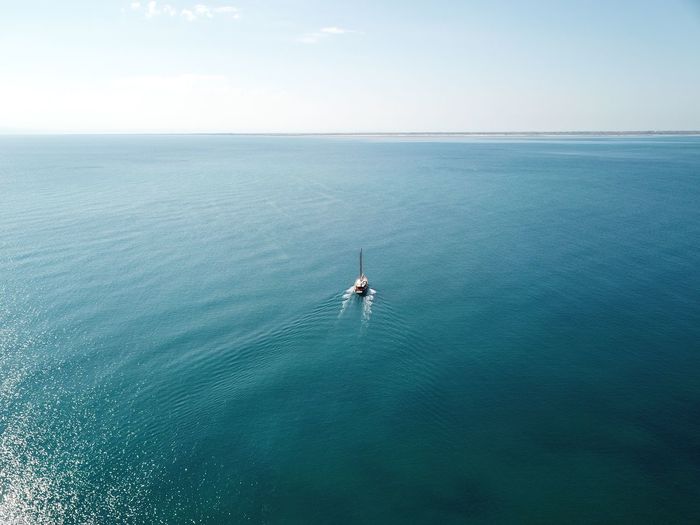 High angle view of a boat on sea against sky