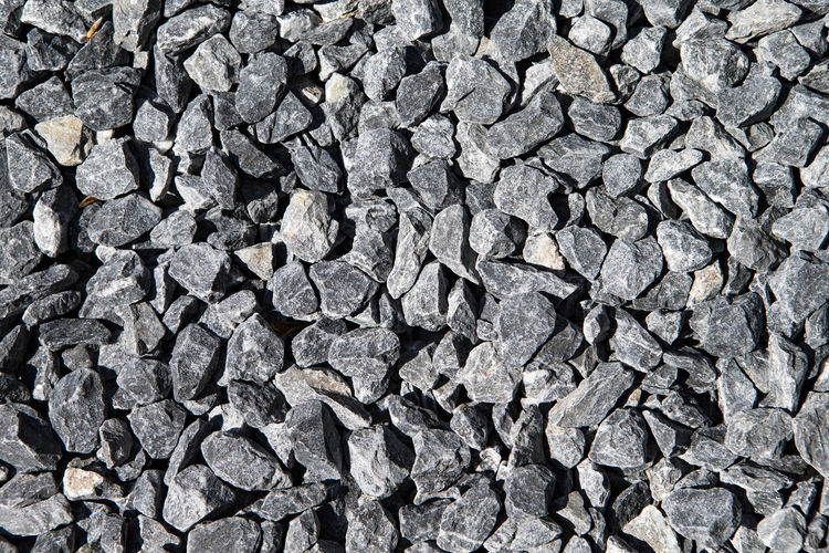 The image shows a grey gravel texture