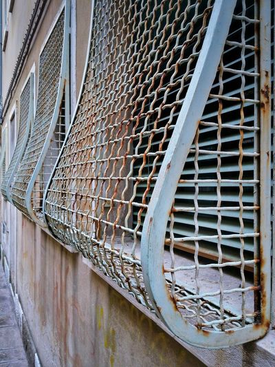 Close-up of series of window grids