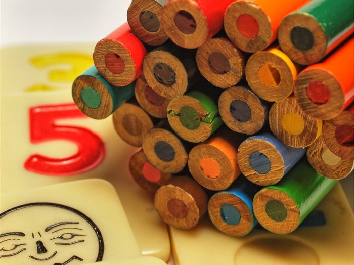 Close-up of colorful pencils on table