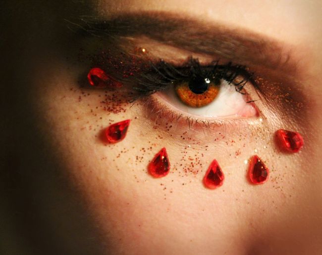 Extreme close-up portrait of woman make-up