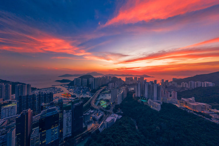 Panoramic aerial view of a stunning sunset over aberdeen and ap lei chau district of hong kong