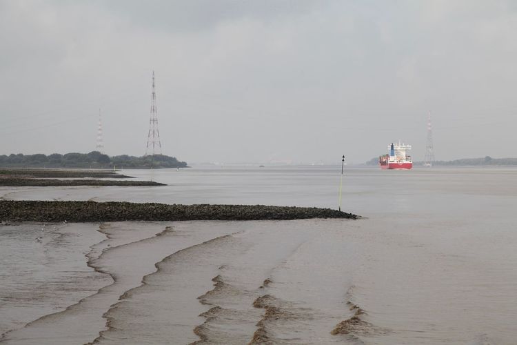 Elbe river against cloudy sky