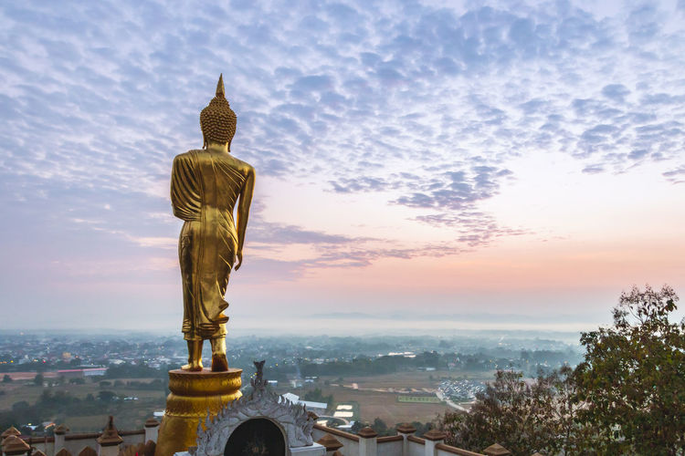 Buddha statue, wat phra that khao noi beautiful and popular viewpoint in nan, thailand