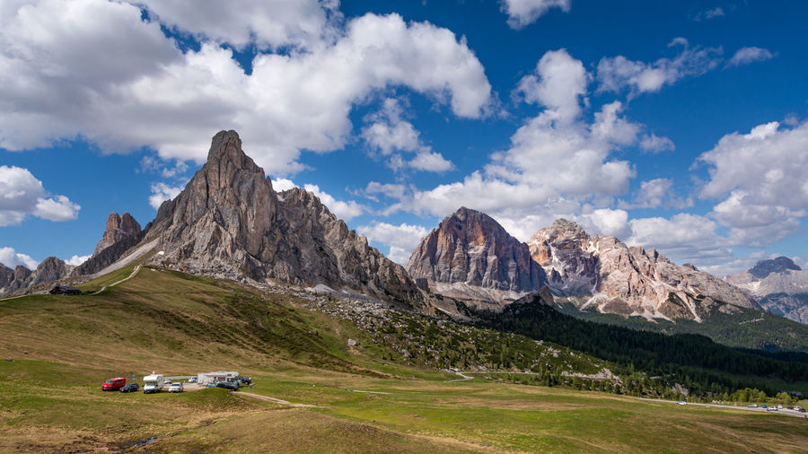 Panoramic landscape of giau pass, with dolomites mountains against sky