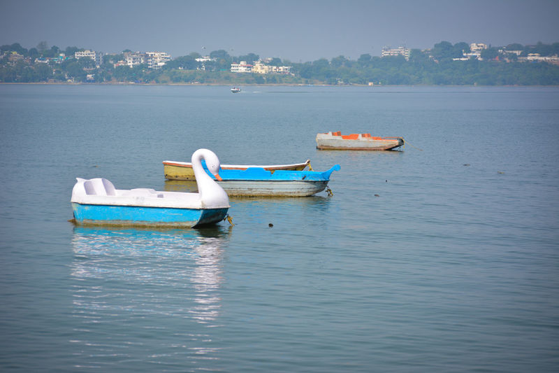 Boats in the upper lake at bhopal which is also known as 'city of lakes'.